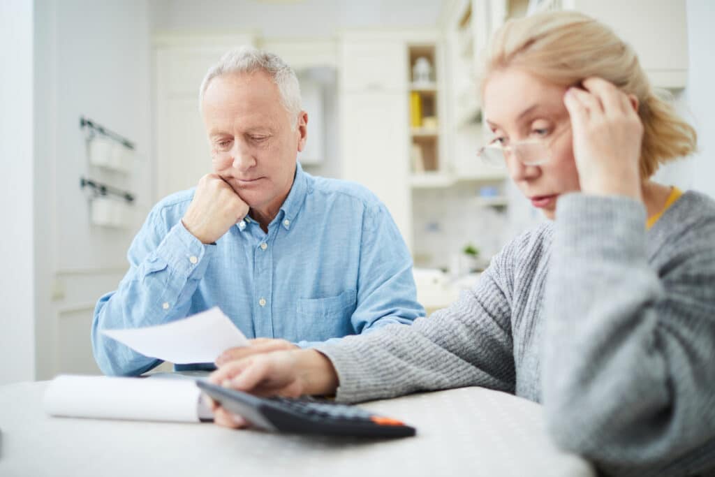 A couple shocked by high energy bills and water heater issues.