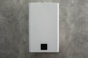 Water heater mounted on house wall, Residential Plumbing Layouts.